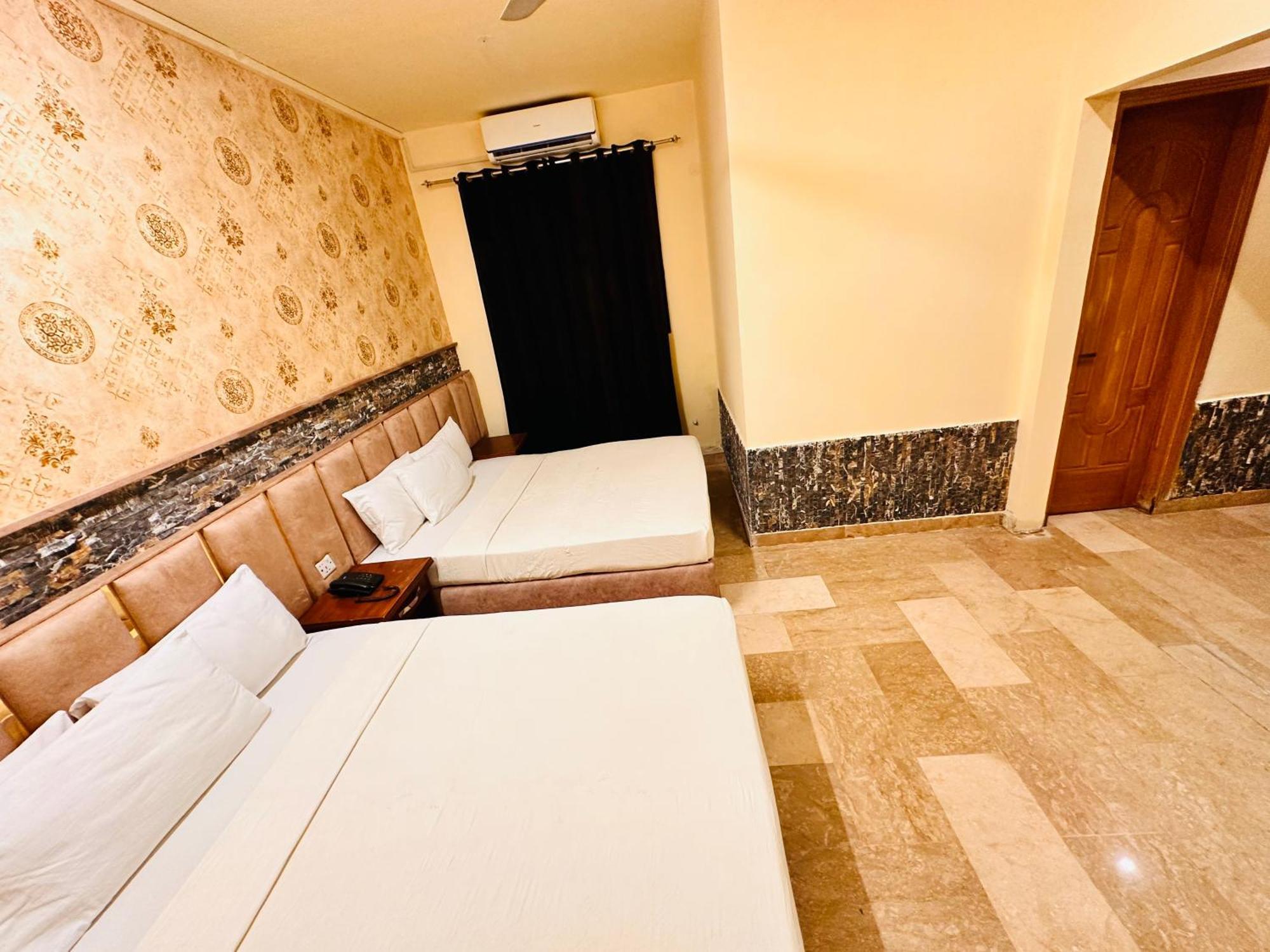 Blue Moon Residency Jinnah Super อิสลามาบัด ภายนอก รูปภาพ